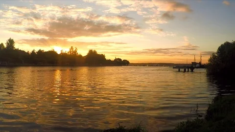 Sunset over the lake and forest in summer Stock Footage 82367365