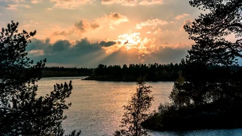 Sunset over lake and forest in Scandinavia Stock Footage 116545087