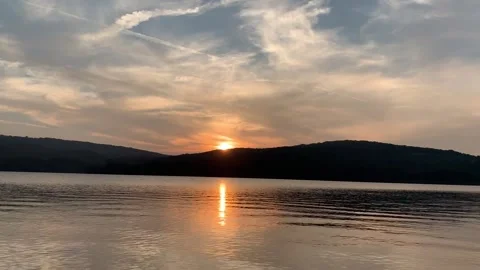 Sunset over the Lake and Mountain Stock Footage 167843637