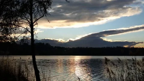 Sunset over lake Annone Stock Footage 69150060