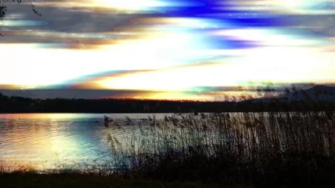 Sunset over lake Annone Video stock 69152896