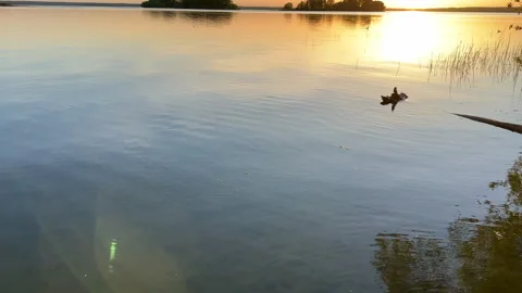 Sunset over the lake. Awesome Sunset with dramatic clouds Stock Footage 276736538