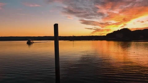 Sunset over the lake with boat Stock Footage 228716909