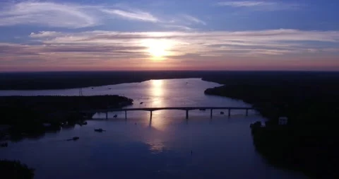 Sunset over the lake with bridge 库存影片 136190168