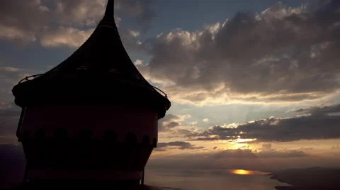 Sunset over a lake with a castle tower in the foreground Stock Footage 41497966