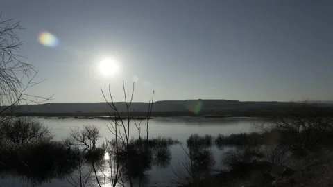 Sunset over the lake in the evening Vídeos de archivo 166698854
