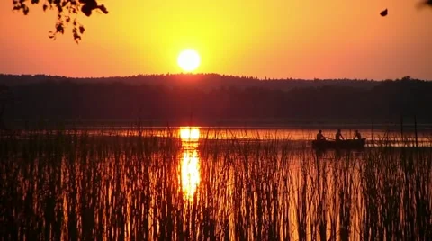 Sunset over the Lake (Floating in a boat) Vídeo Stock 11615710