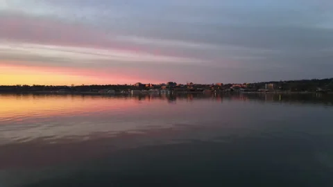 Sunset over the lake flying towards Burlington Vermont Stock Footage 132238992