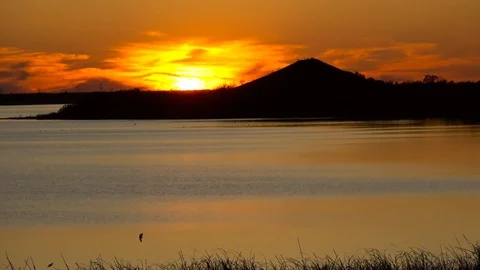 Sunset over the lake. Stock Footage 120190235