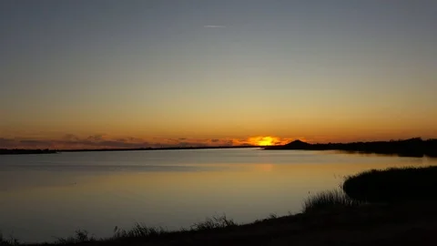 Sunset over the lake. Stock Footage 120190286