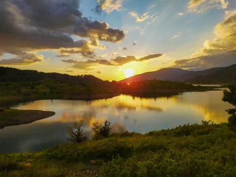 Sunset over the lake in Greece eastern europe Stock Photos