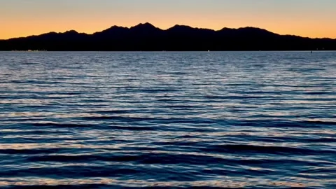 Sunset over Lake Havasu. Looking toward the California side Stock Footage 300316645