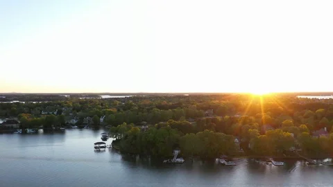 Sunset over lake high angle view Stock Footage 107561519