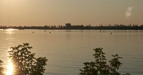 Sunset over lake with kayaking Stock Footage 201487523
