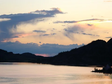 Sunset over the lake in the mountains Stock Footage 76926160