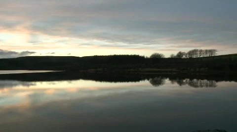 Sunset over lake pan Stock Footage 297962