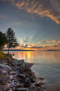 Sunset over lake Stock Photos