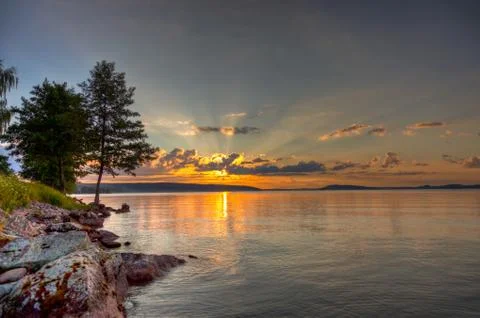 Sunset over lake Stock Photos