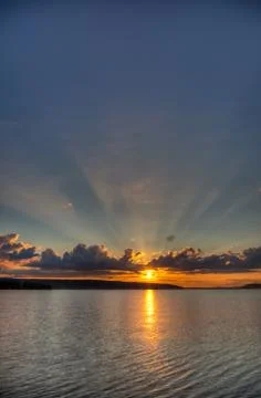 Sunset over lake Stock Photos