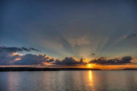 Sunset over lake Stock Photos