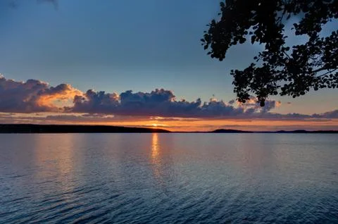 Sunset over lake Stock Photos