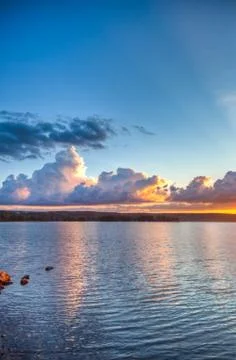 Sunset over lake Stock Photos