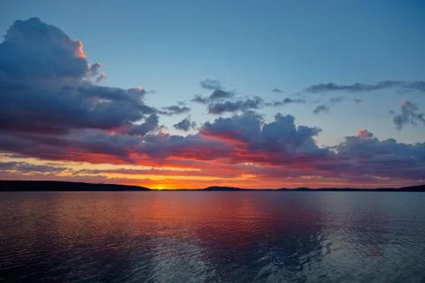 Sunset over lake Stock Photos