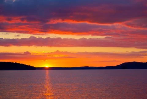 Sunset over lake Stock Photos
