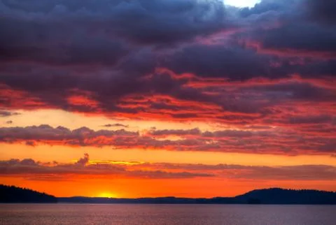 Sunset over lake Stock Photos