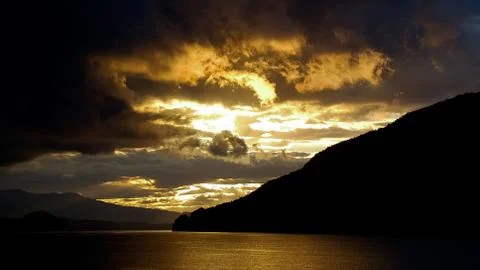 Sunset over the lake Stock Photos