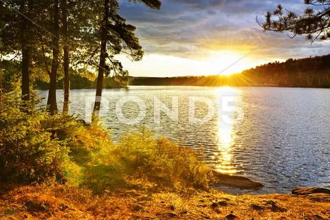 Sunset over lake Stock Photos