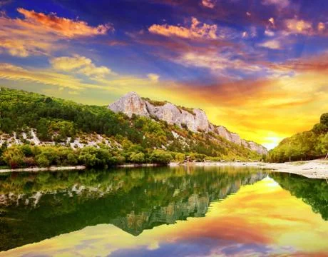 Sunset over the  lake Stock Photos