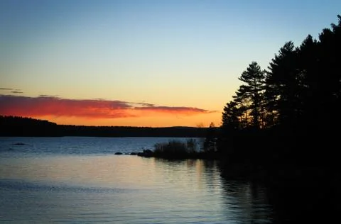 Sunset Over a Lake Foto stock