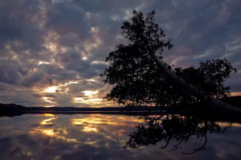 Sunset over the lake Stock Photos