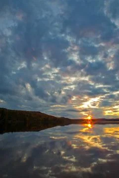 Sunset over the lake Stock Photos