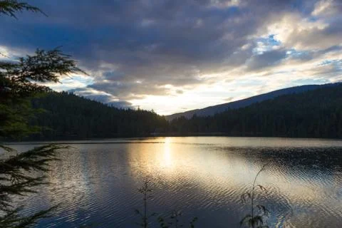 Sunset over lake Stock Photos