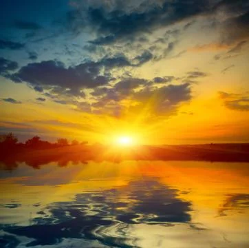 Sunset over lake Stock Photos