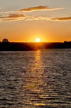 Sunset over lake Stock Photos