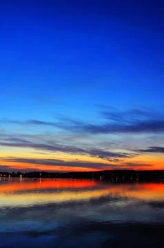 Sunset over lake Stock Photos