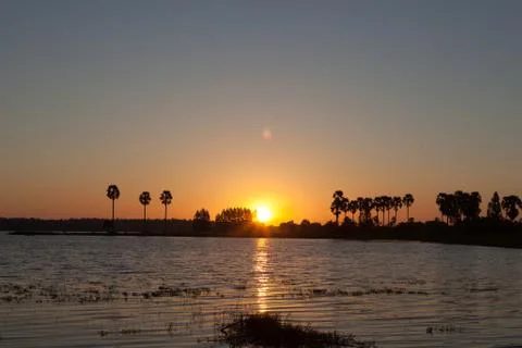 Sunset over lake Stock Photos