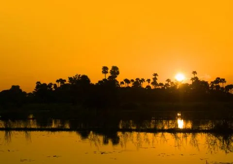SUNSET OVER LAKE Stock Photos