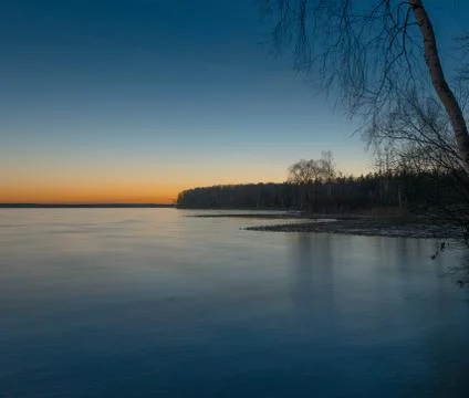Sunset over the lake Stock Photos