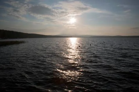 Sunset over the lake Stock Photos