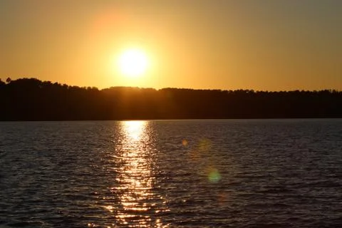 Sunset over lake Stock Photos