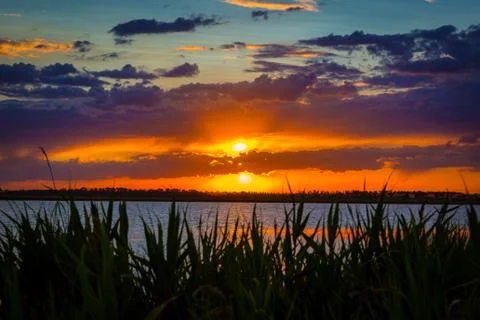 Sunset over lake Stock Photos