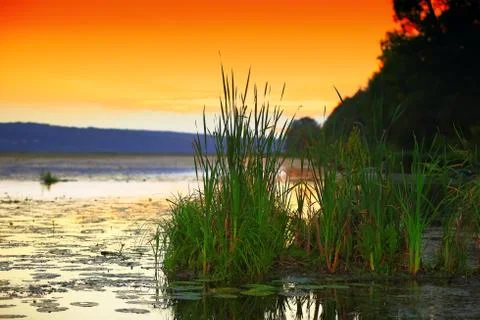 Sunset over the lake Stock Photos