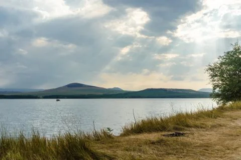 Sunset over a lake Stock Photos