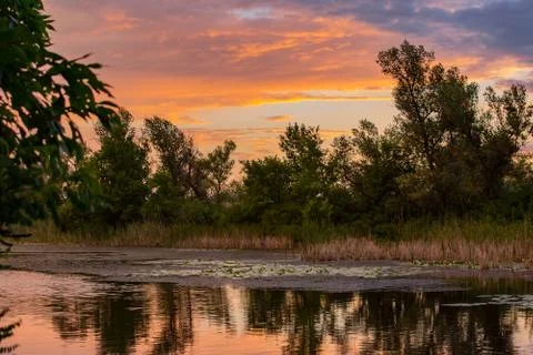 Sunset over lake Stock Photos