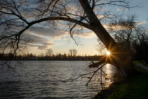 Sunset over a lake Stock Photos