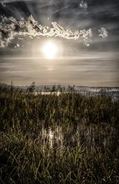 Sunset over the lake Stock Photos